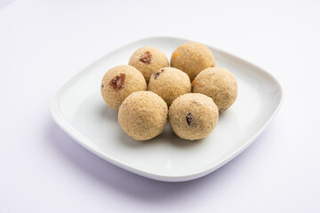 Rava Laddu or sooji ladoo is an Indian Sweet made with semolina, sugar, ghee, cashews and raisins
