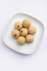 Rava Laddu or sooji ladoo is an Indian Sweet made with semolina, sugar, ghee, cashews and raisins
