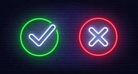 Cancel and Check mark neon sign ok, yes on brick wall background. Rejection and Approved neon symbol. © TanyaFox
