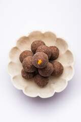 Nachni laddu or Ragi laddoo or sweet balls made using finger millet, jaggery and ghee