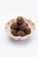 Nachni laddu or Ragi laddoo or sweet balls made using finger millet, jaggery and ghee