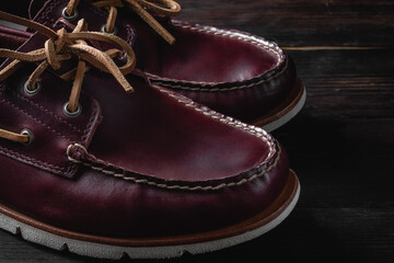 Fototapeta na wymiar Leather boat shoes. Brown leather boat shoes.
