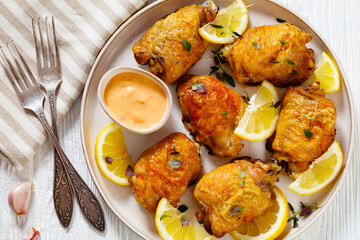 roast chicken thighs with lemon, thyme and spices