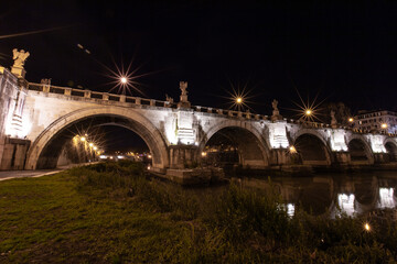 Rome, Italy, the bridge in the night city is beautifully illuminated.