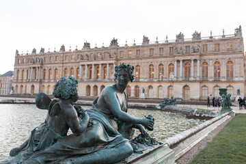 Fototapeta na wymiar Versailles France sculptures in the courtyard of the castle, facade architecture.