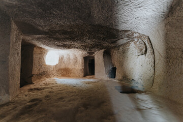 A cave church in Cappadocia with inscriptions on the walls, frescoes from the beginning of...