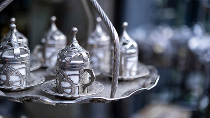 authentic turkish coffee cup and the way it is served, blurred background, image with spaces and text space
