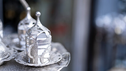 authentic turkish coffee cup and the way it is served, blurred background, image with spaces and text space