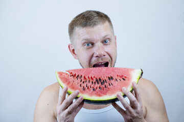 man eating watermelon