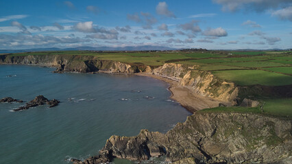 Fototapeta premium Drone view of Hills of Cooper Coast of Waterford Ireland. Garrarus beach in Tramore. Irish coastline