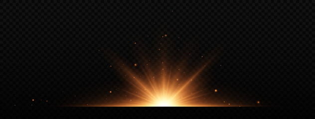 Bright golden flashes on black background. Shining star, beautiful golden rays. Optical flare.