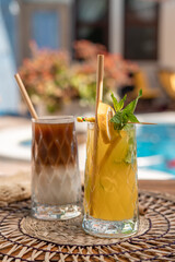 Cocktails at poolside. Summer vacation concept