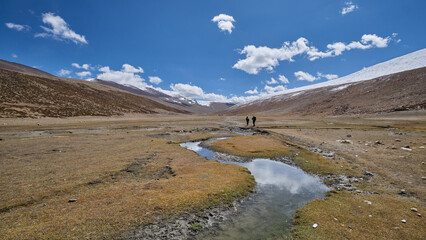 Two hikers heading to Nimaling campsite in Markha valley, Ladakh