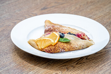 pancake with fruit and marmalade for breakfast and as dessert