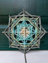Woven bright God's eye mandala home talisman