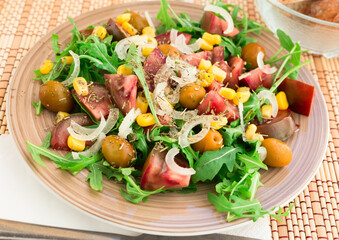 fresh vegetarian healthy vegetable salad with arugula