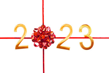 2023 golden numbers, red gift bow and ribbon isolated on white background, new year greeting card