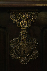 Fototapeta premium Antient metal lock on an old wooden chest