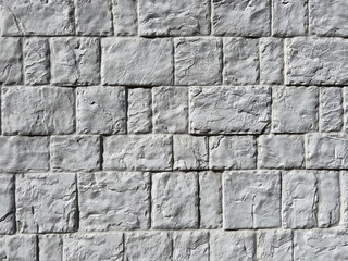 Old chipped white brick wall texture