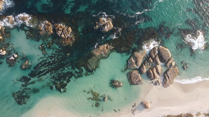 Aerial picture. Forest, sand and rocks at the beach. Top down drone photography. Wild and beautiful place to visit in Western Australia. Two peoples bay nature reserve in Albany. National park. © Elsa