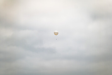 radiosonde weather balloon in the sky