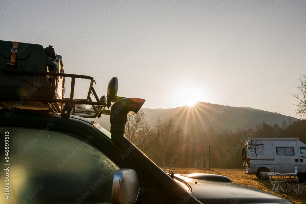 Wall mural vanlife. two campers at sunrise