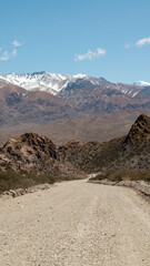 Highway over the Andes Mountains with snow-capped mountains in the background