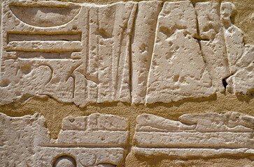 ancient hieroglyphs on a stone wall in egypt