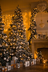 warm and cozy evening in Christmas room interior design,Xmas tree decorated by lights presents gifts,toys, deer,candles, lanterns, garland lighting indoors fireplace.holiday living room.magic New year