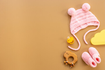 Baby infant hat with booties and kids accessories, flat lay