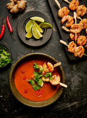 Pumpkin soup with grilled prawns