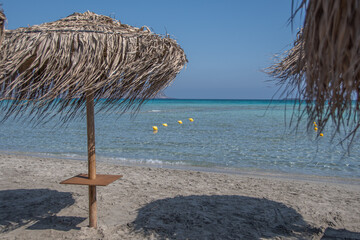 Fototapeta na wymiar A stretch of beach on the pink beach of Elafonissi on the Greek island of Crete