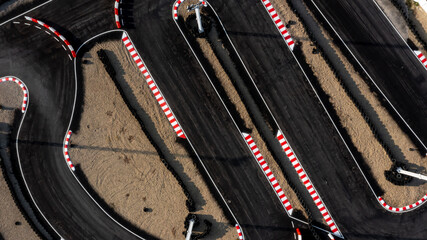 Aerial top view race kart track, Track for auto racing top view, Car race asphalt and curve grand prix street circuit, Aerial view asphalt race track. - obrazy, fototapety, plakaty