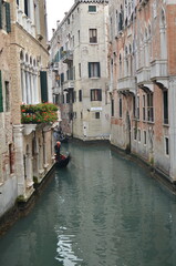 Fototapeta na wymiar small canal venice italy romatic gondoliere bridge beautiful
