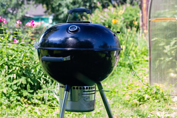 Black charcoal kettle grill