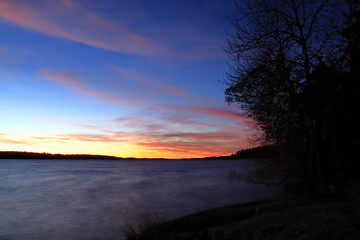 Fototapeta na wymiar One Swedish night. Landscape or seascape at lake Malaren. Autumn of 2022.