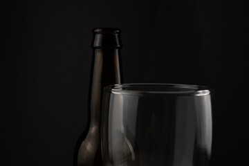 A bottle of beer in a black bottle