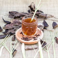 Indonesian traditional drink called lemongrass tea which is made from a mixture of pure tea and lemongrass stems brewed with a little sugar and cloves and bay leaves keeps the body warm and healthy