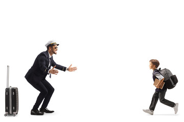 Schoolboy in a uniform running towards a pilot © Ljupco Smokovski