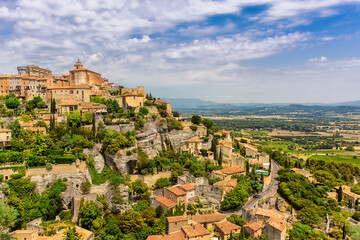 Scenic view of the village of Gordes in Provence, south of France against dramatic sky