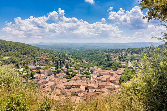 Scenic view of Cotignac village in Provence, south of France against dramatic summer sky