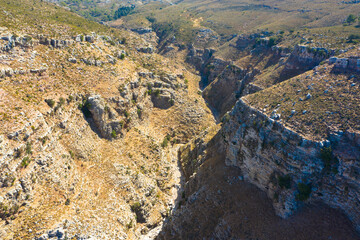 Aerial view of Jacobs Canyon. Brown massive stones and rocks in mountain canyon. Located between Siana and Embona. Rhodes, Greece.