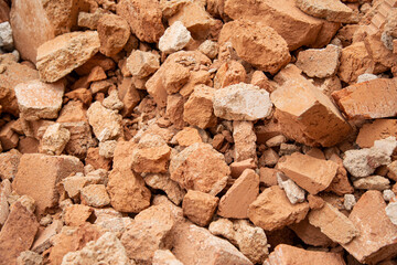 Shattered, broken  Red clay Ceramic Bricks,  construction waste after building demolition. collection service