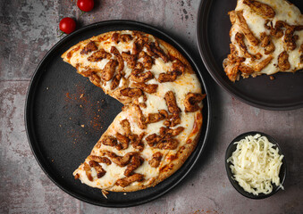 Delicious pizza with a sophisticated background of cheese and vegetables
