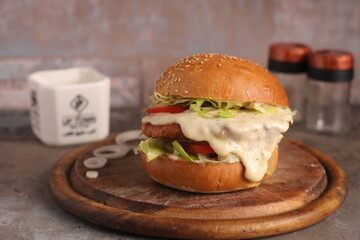 Homemade cheeseburger on an upscale table for lunch and dinner