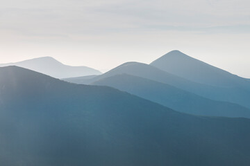 Beautiful mountain landscape. Green and blue mountains and hills. Carpathian Mountains, Ukraine