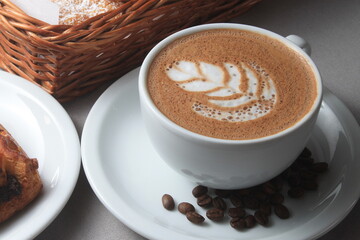 cup of coffee with beans