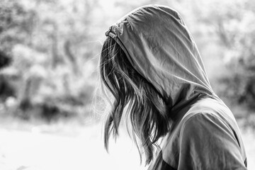Pondering woman in black and white