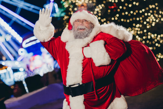 Photo of funky good old man grandpa waving hand ready night adventure present miracle everyone midnight coming newyear spirit outdoor