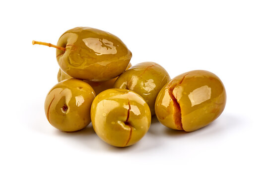 Green big olives, isolated on white background.